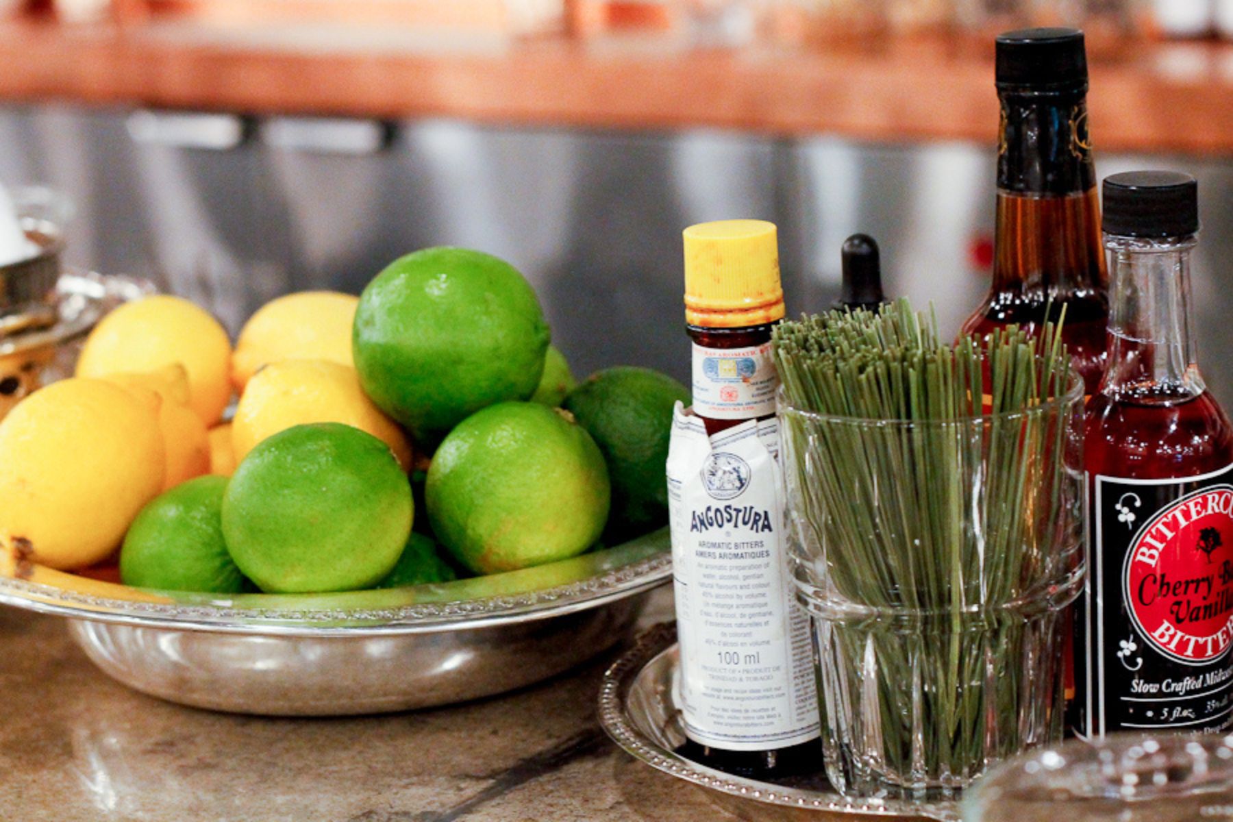 Bitters bottles and citrus fruit